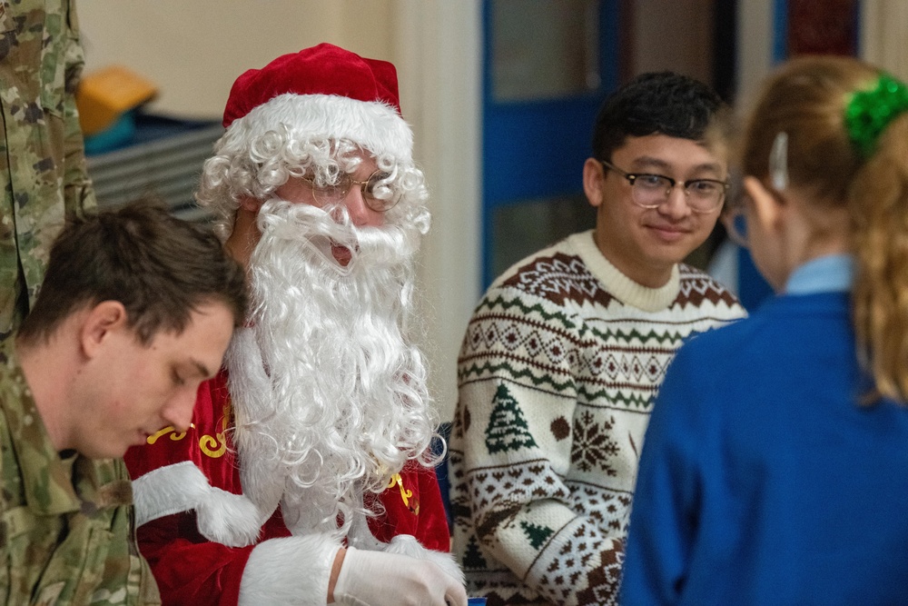 Pathfinders bring holiday cheer to local schools