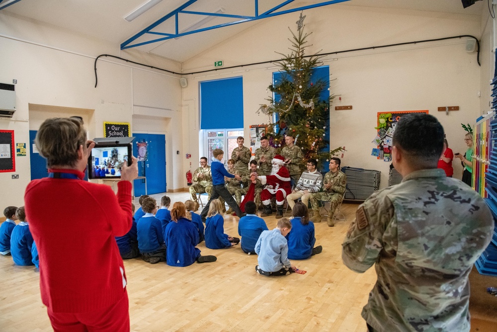 Pathfinders bring holiday cheer to local schools