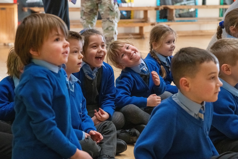 Pathfinders bring holiday cheer to local schools