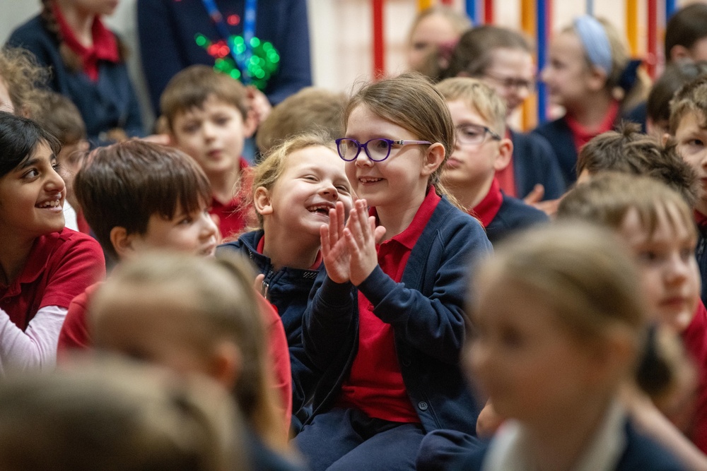 Pathfinders bring holiday cheer to local schools