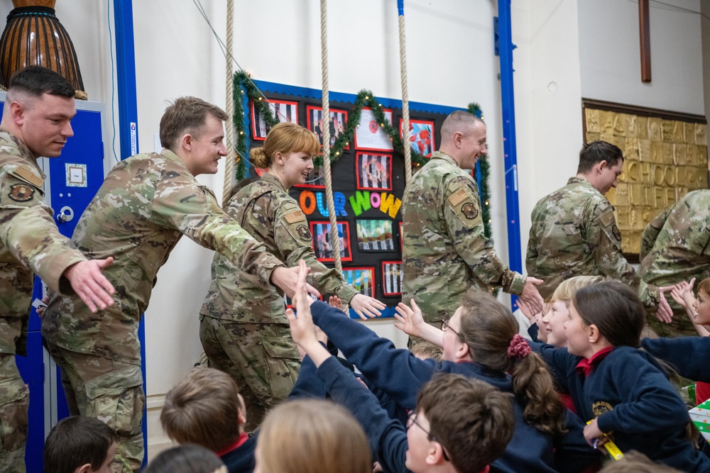 Pathfinders bring holiday cheer to local schools