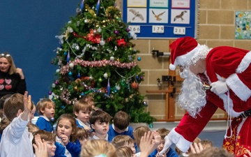 Pathfinders bring holiday cheer to local schools