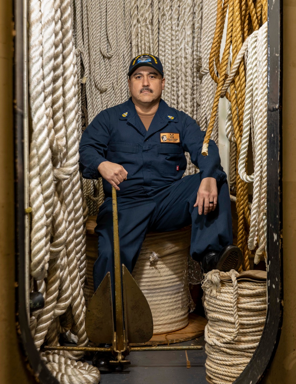USS Abraham Lincoln’s division leading petty officer of deck department poses for an environmental portrait