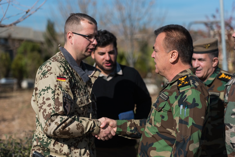 Coalition Advisors Discuss Logistical Matters with Peshmerga
