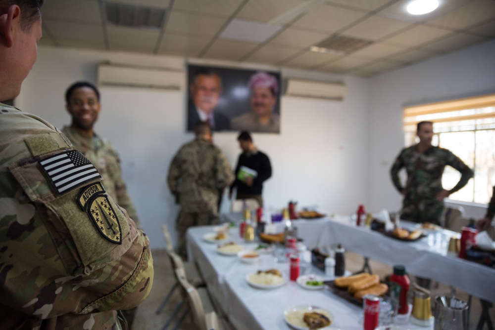 Coalition Advisors Discuss Logistical Matters with Peshmerga