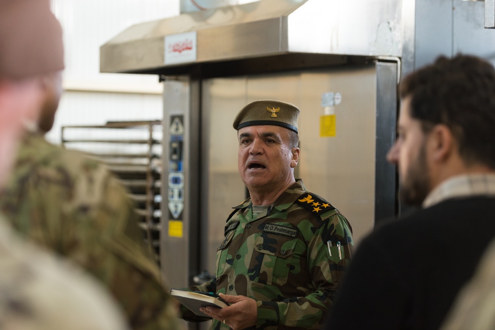 Coalition Advisors Discuss Logistical Matters with Peshmerga