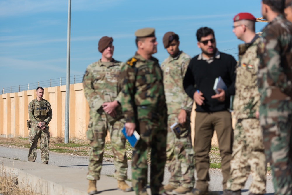 Coalition Advisors Discuss Logistical Matters with Peshmerga
