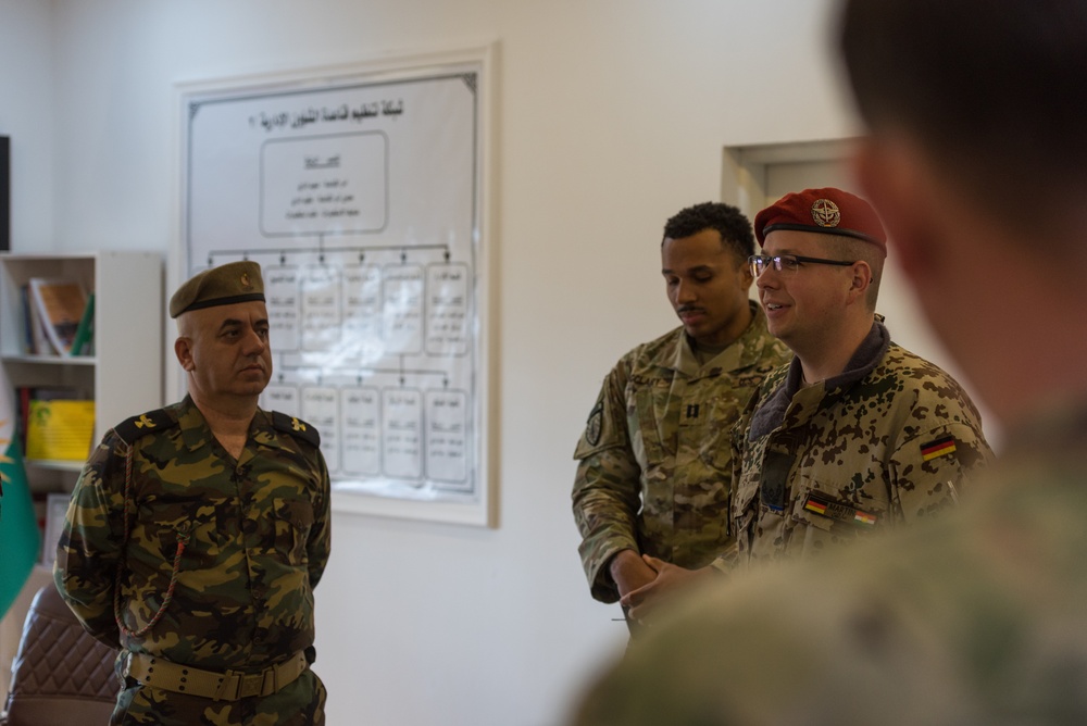 Coalition Advisors Discuss Logistical Matters with Peshmerga