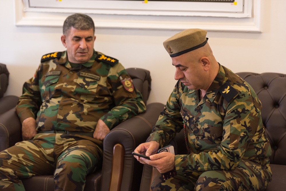 Coalition Advisors Discuss Logistical Matters with Peshmerga