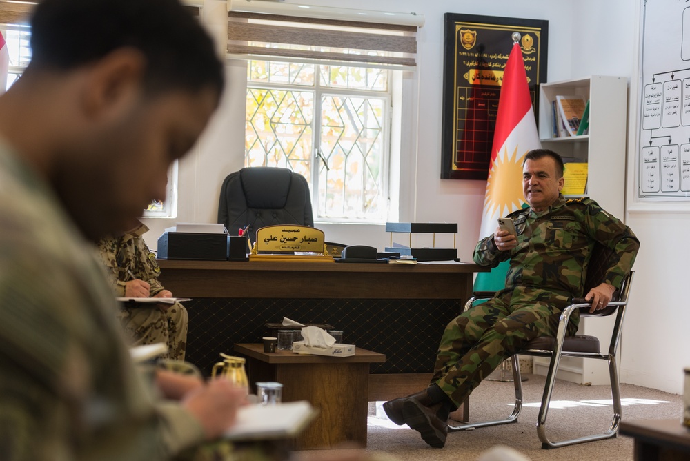 Coalition Advisors Discuss Logistical Matters with Peshmerga