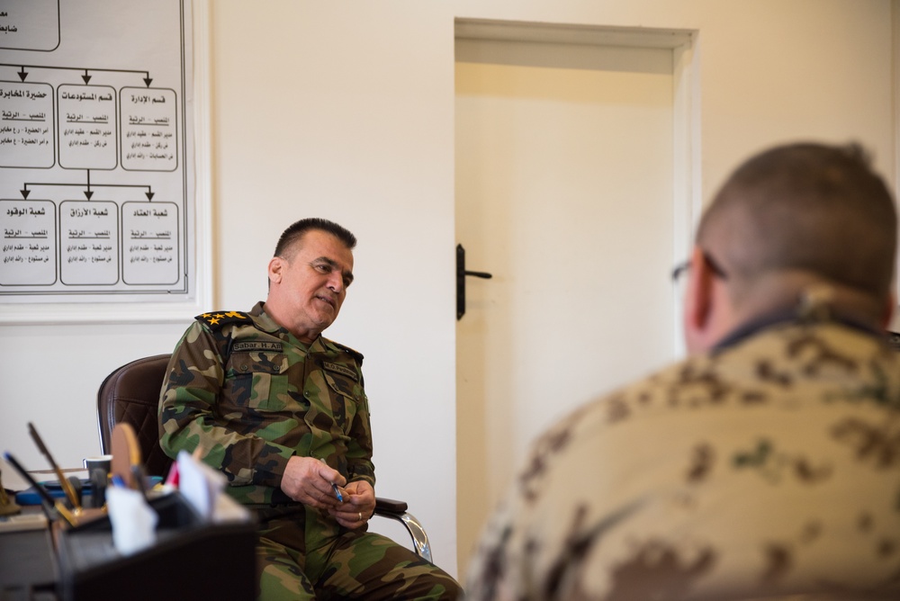Coalition Advisors Discuss Logistical Matters with Peshmerga
