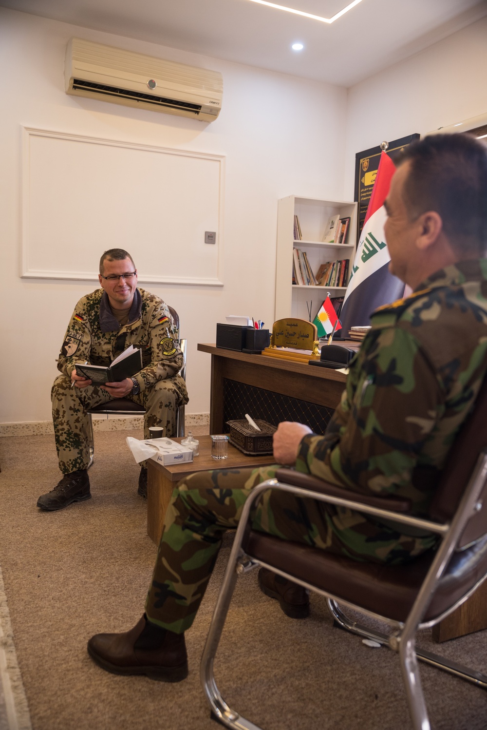 Coalition Advisors Discuss Logistical Matters with Peshmerga