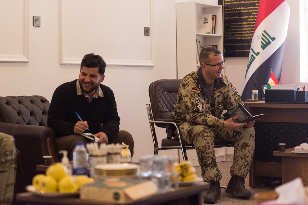 Coalition Advisors Discuss Logistical Matters with Peshmerga