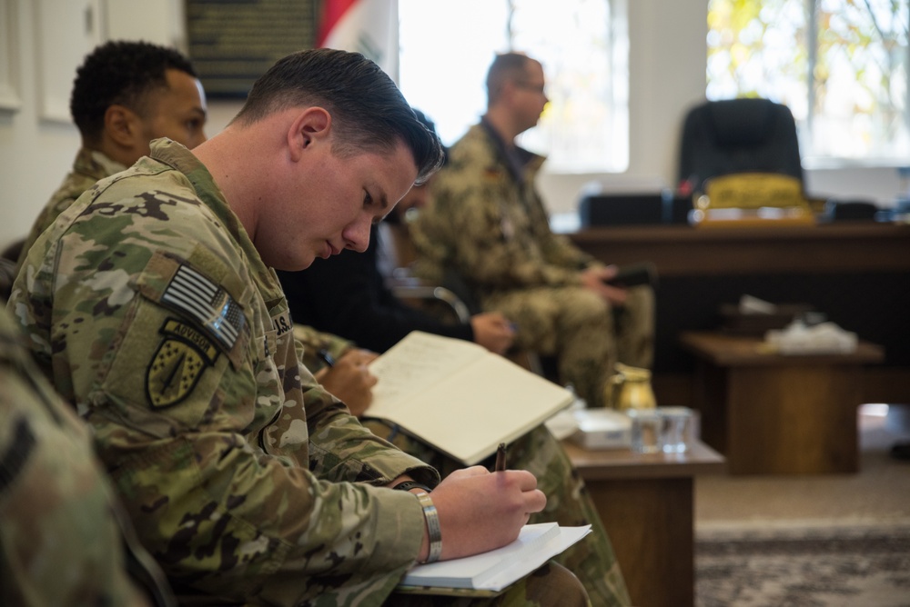Coalition Advisors Discuss Logistical Matters with Peshmerga