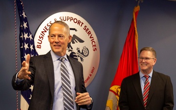 Navy-Marine Corps Relief Society receives check from Business and Support Services Division