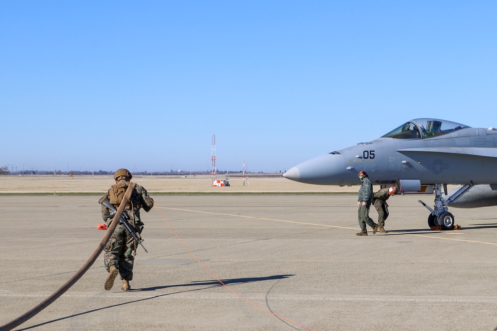 Steel Knight 24: VMFA-232 receives fuel from MWSS-373 Marines at forward arming and refueling point, Beale AFB