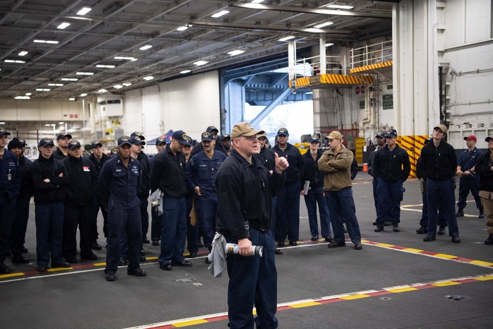 USS Ronald Reagan (CVN 76) conducts a joint damage control drill