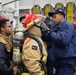 USS Ronald Reagan (CVN 76) conducts a joint damage control drill