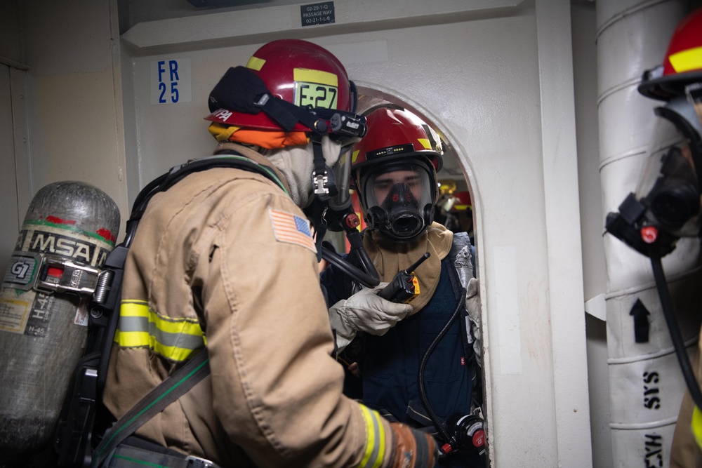 USS Ronald Reagan (CVN 76) conducts a joint damage control drill