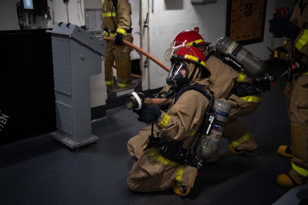 USS Ronald Reagan (CVN 76) conducts a joint damage control drill