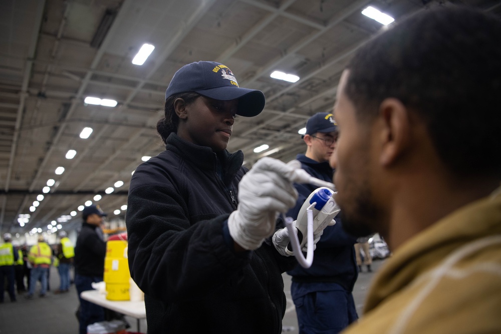 USS Ronald Reagan (CVN 76) conducts a joint damage control drill