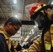 USS Ronald Reagan (CVN 76) conducts a joint damage control drill