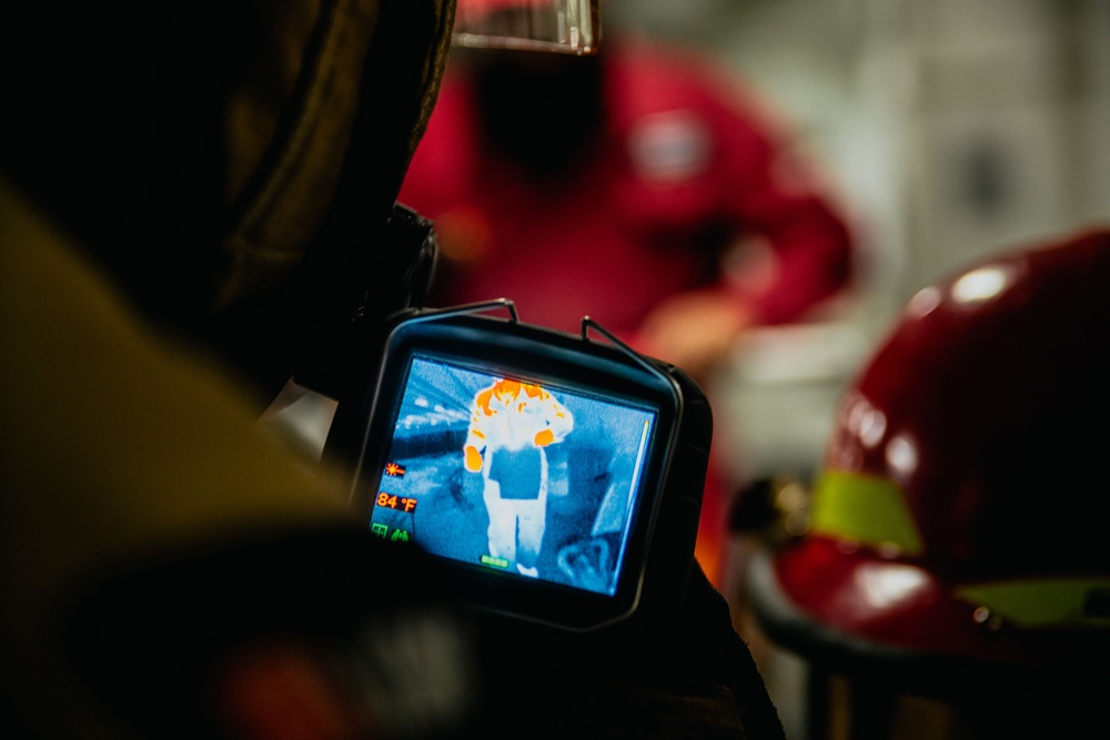 USS Ronald Reagan (CVN 76) conducts a joint damage control drill