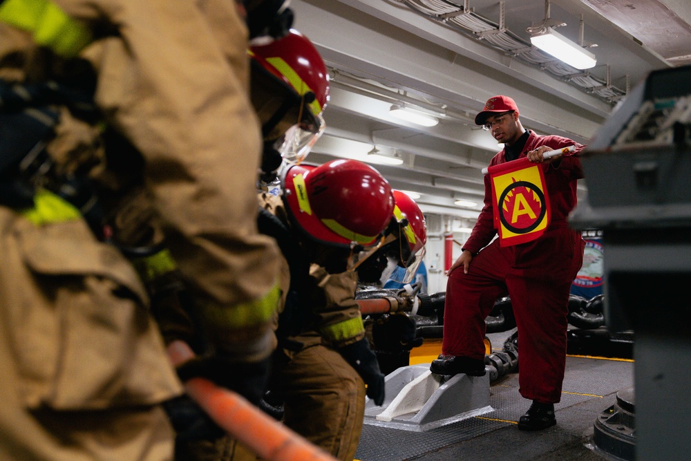 USS Ronald Reagan (CVN 76) conducts a joint damage control drill