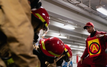 USS Ronald Reagan (CVN 76) conducts a joint damage control drill