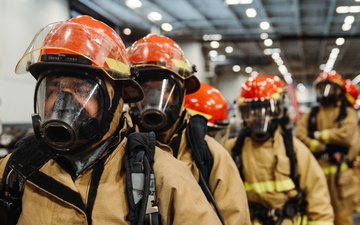 USS Ronald Reagan (CVN 76) conducts a joint damage control drill