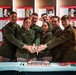 Univ. of Ark. Army Officers Celebrate Commissioning with Ceremonial Cake-Cutting