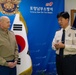 Col. Ronnie D. Michael awards Mr. Ryu Deuk Gon Pohang Nambu Fire Station Chief with the Certificate of Commendation