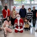 U.S. Marine Corps gives gifts to a local shelter in the city of Naha through Merry Marine Toy Drive