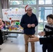 U.S. Marine Corps gives gifts to a local shelter in the city of Naha through Merry Marine Toy Drive