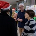 U.S. Marine Corps gives gifts to a local shelter in the city of Naha through Merry Marine Toy Drive