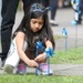 Youth display pinwheels to promote prevention of child abuse