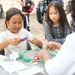 Youth display pinwheels to promote prevention of child abuse