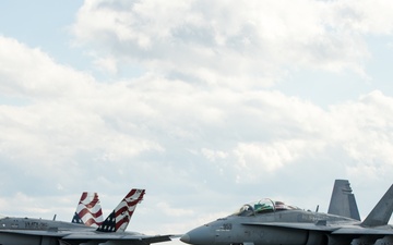 U.S. Marine is rewarded for their hard work with a ride in an F/A-18