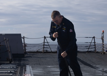 Sailors Conduct Fresh-Water Wash Down Aboard USS Oscar Austin (DDG 79)