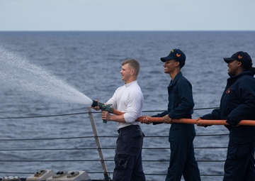 Sailors Conduct Fresh-Water Wash Down Aboard USS Oscar Austin (DDG 79)