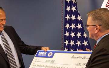 Navy-Marine Corps Relief Society receives check from Business and Support Services Division