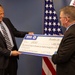 Navy-Marine Corps Relief Society receives check from Business and Support Services Division