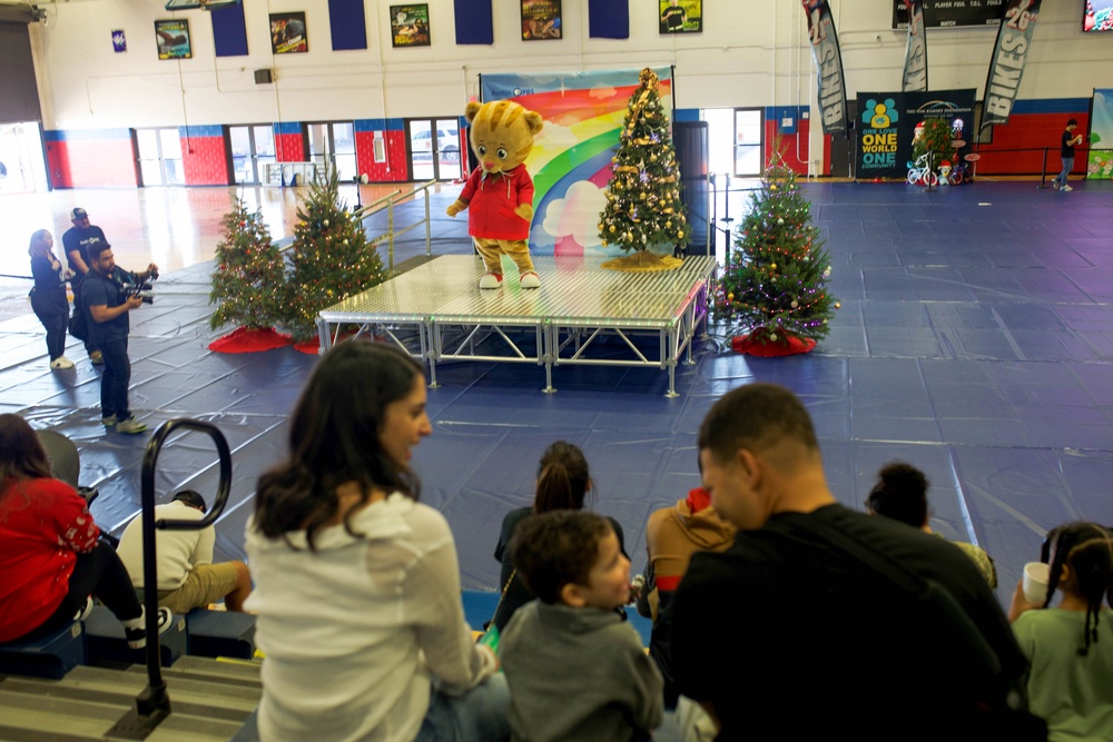 Daniel Tiger, nonprofit delight Fort Cavazos children with fun, gift cards