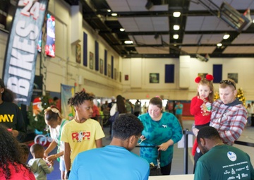 Daniel Tiger, nonprofit delight Fort Cavazos children with fun, gift cards