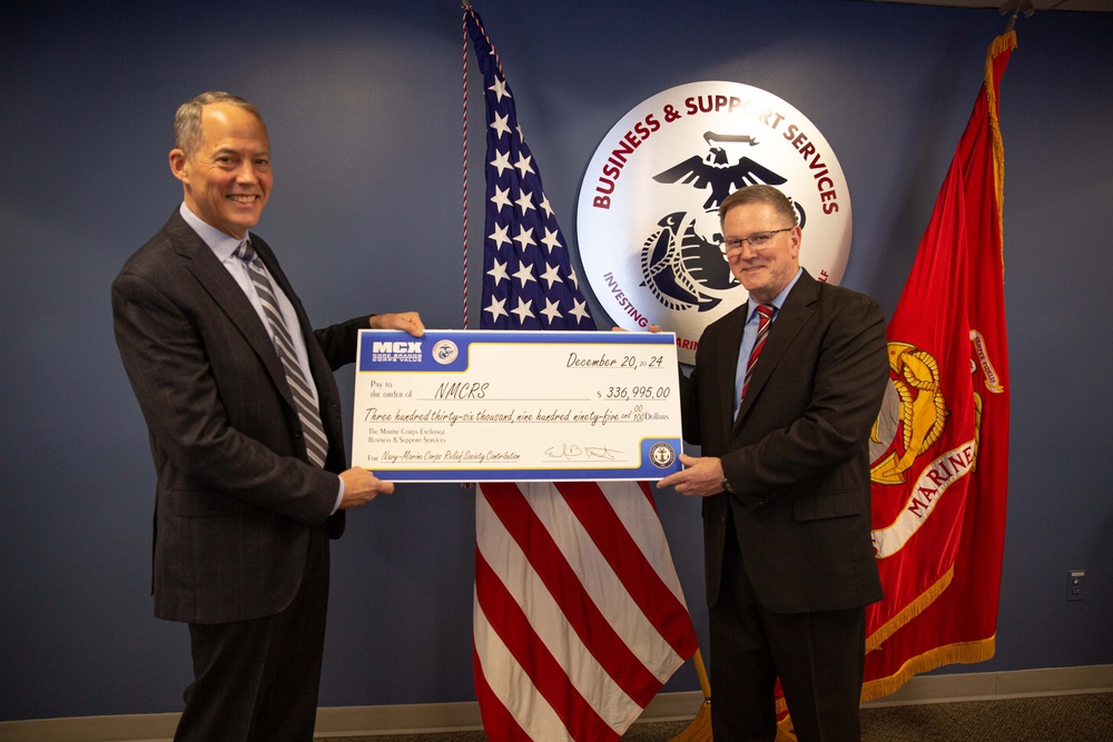 Navy-Marine Corps Relief Society receives check from Business and Support Services Division