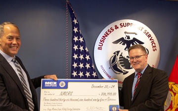 Navy-Marine Corps Relief Society receives check from Business and Support Services Division