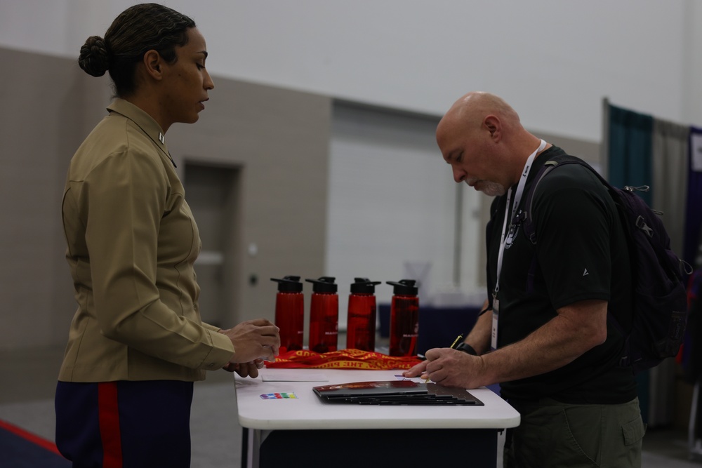 Marines Speak With Coaches At AVCA Convention 2024