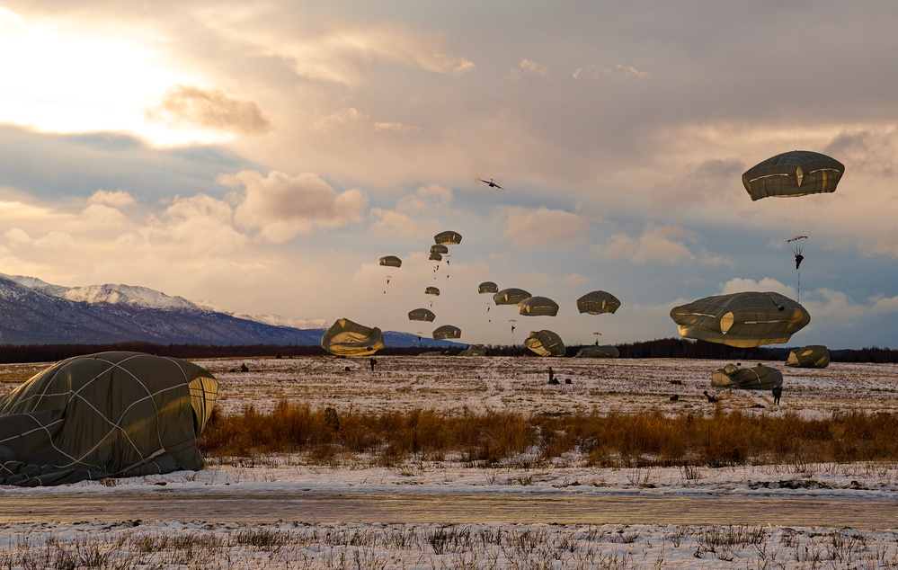 2nd Infantry Brigade, 11th Airborne Division Soldiers conducted a winter jump into Malamute DZ