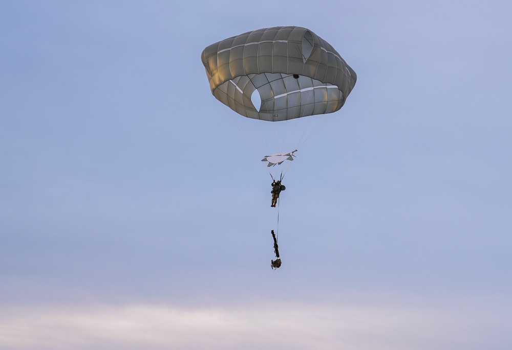 2nd Infantry Brigade, 11th Airborne Division Soldiers conducted a winter jump into Malamute DZ