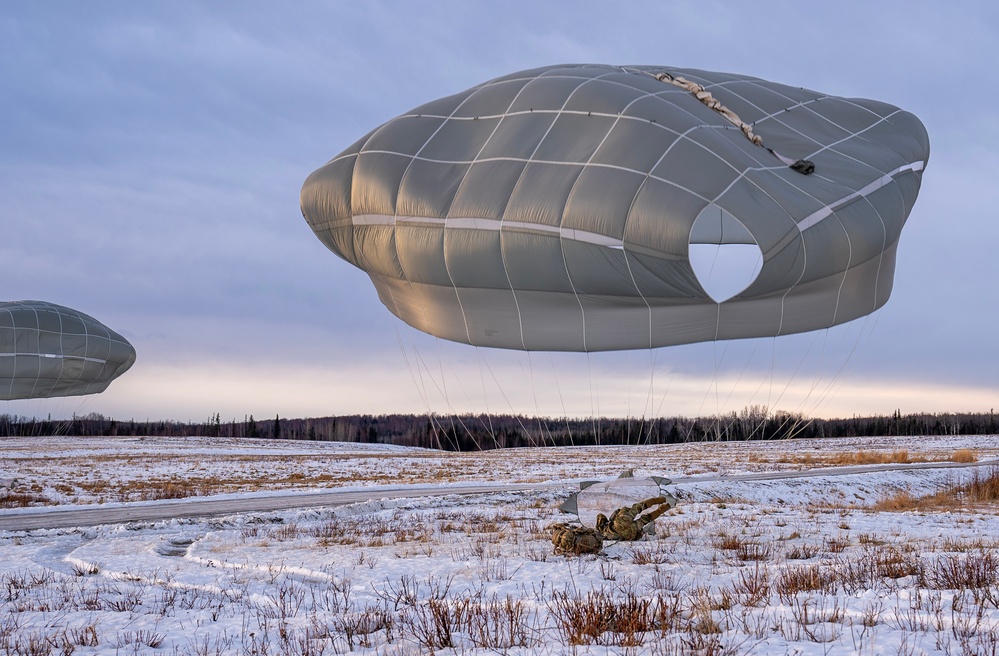 2nd Infantry Brigade, 11th Airborne Division Soldiers conducted a winter jump into Malamute DZ